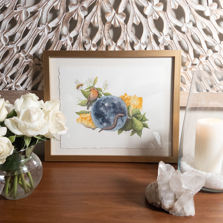 Virgo full worm moon framed watercolor painting styled with roses, large crystal and candle for sacred space home décor